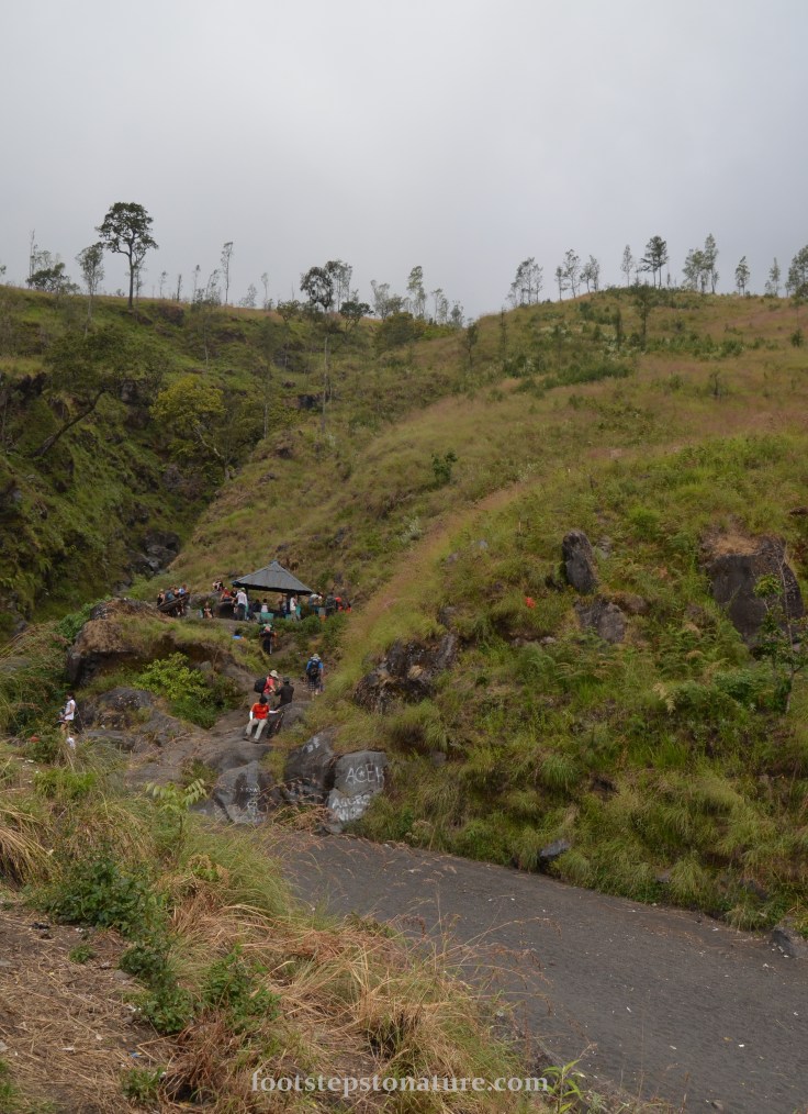 2.00pm – Post 3. The road below is actually made up of small black stones carried from the volcano during rainy season